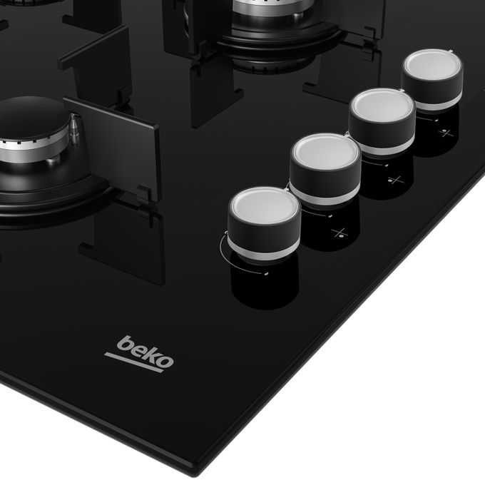 Plaque de cuisson à gaz encastrable BEKO HILG64120S, 4 feux, inox argent, 60x60 cm, vue de dessus avec commandes à droite.

